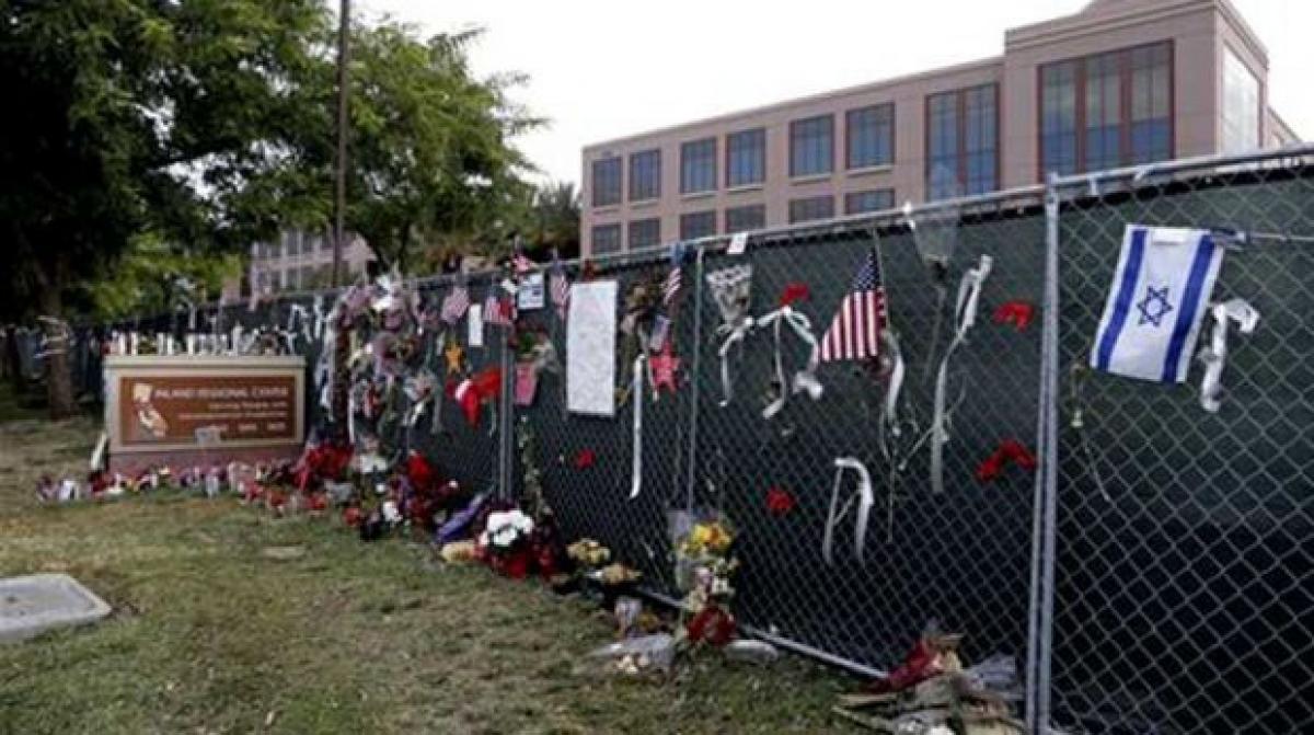 Workers return to San Bernardino offices following massacre